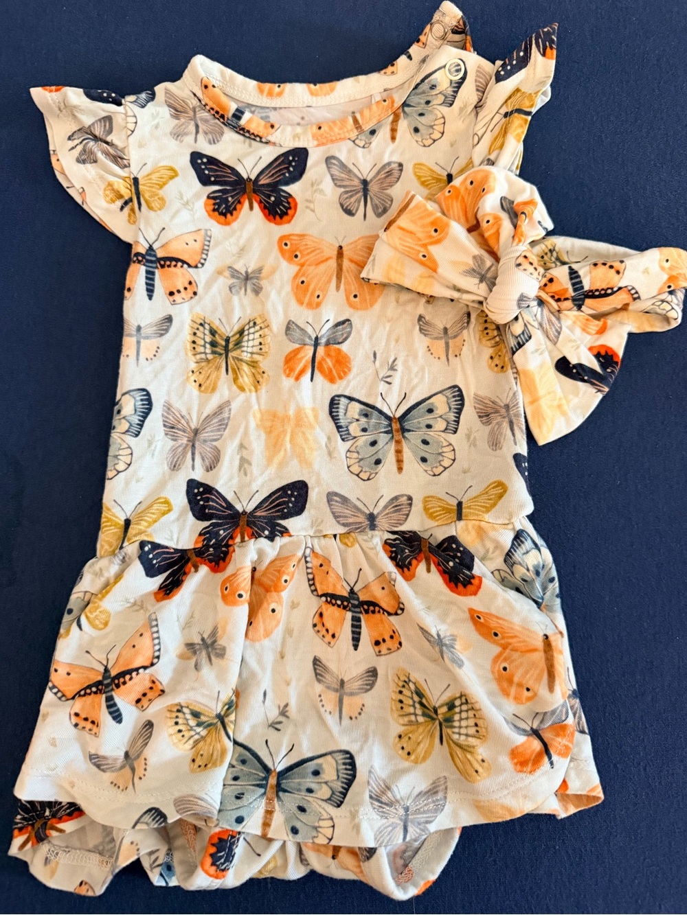 Butterfly Print Cream & Orange Baby One-Piece with Bow